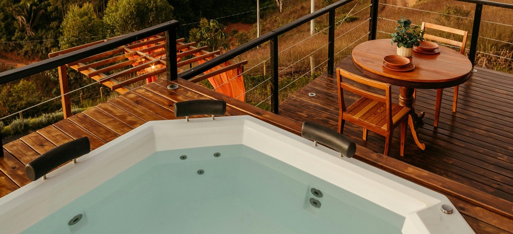 An outdoor hot tub on a deck