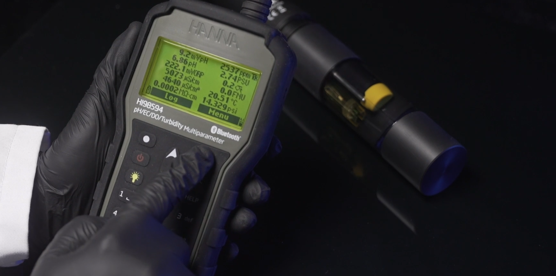 an image of the HI-98594 multimeter for measuring water against a black background