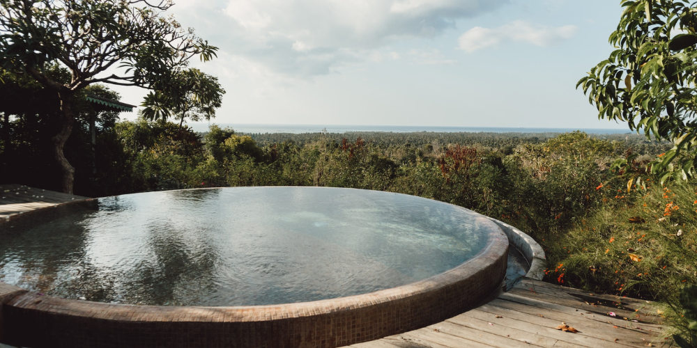 An outdoor hot tub built into decking that may require HSG282 compliance