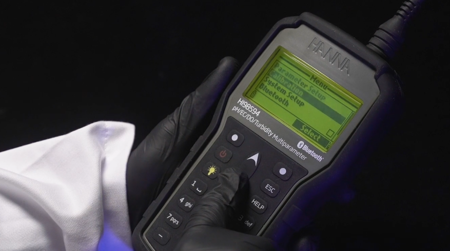 an image of the HI-98594 field water meter being operated against a black background
